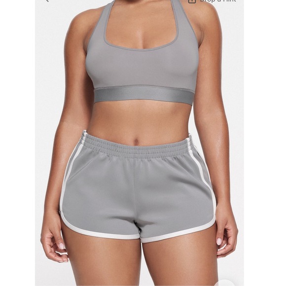 RARE / SOLD OUT/ SKIMS Track Dolphin Shorts  Size L Pacific Gray White Trim - Picture 1 of 10